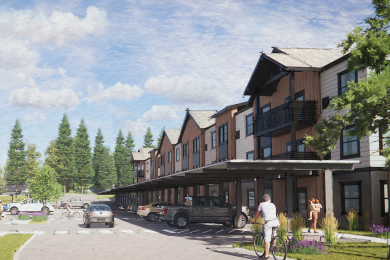 Modern townhouse complex with covered parking, balconies, trees, cars, and people walking and biking on a sunny day